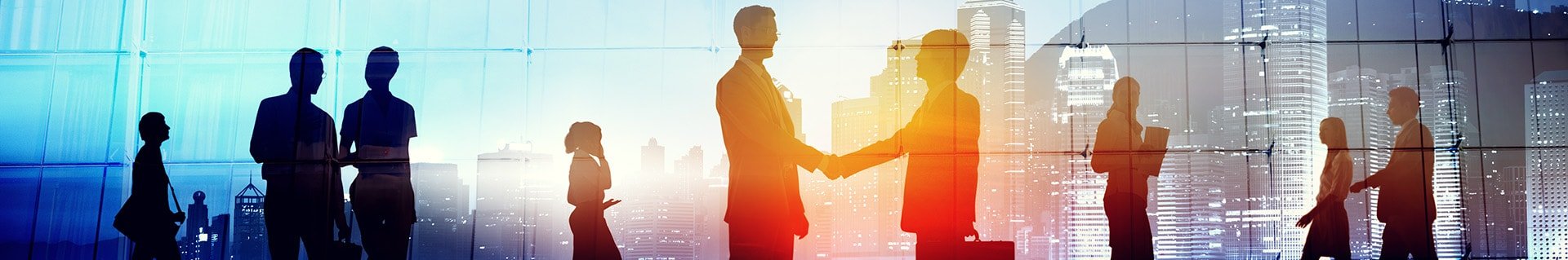 Markets header image Silhouettes of business people doing various activities in front of cityscape